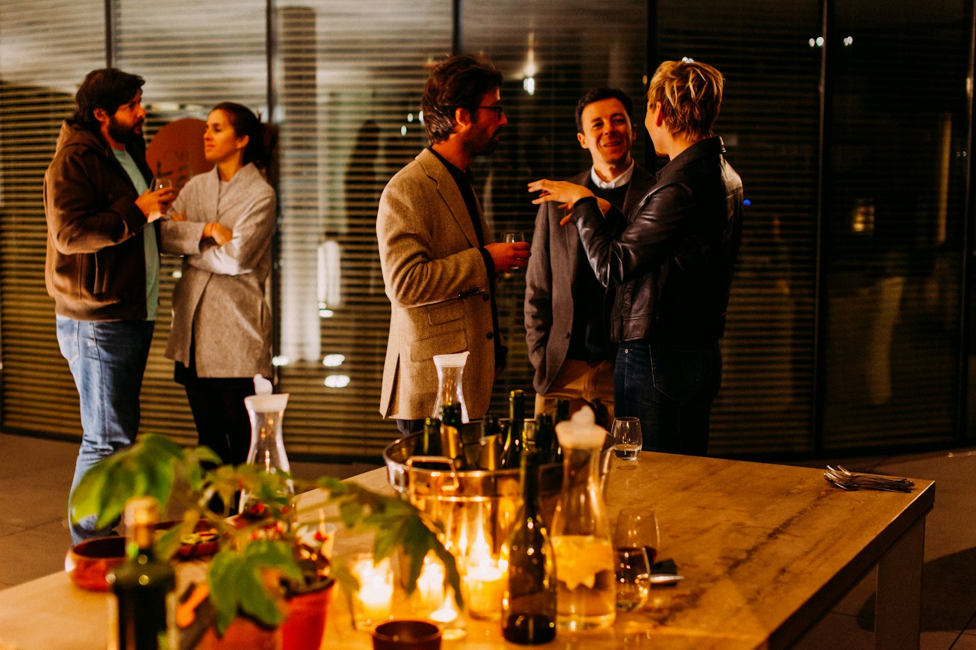 People sharing a meaningful conversation at a gathering. Illustrative community scene.